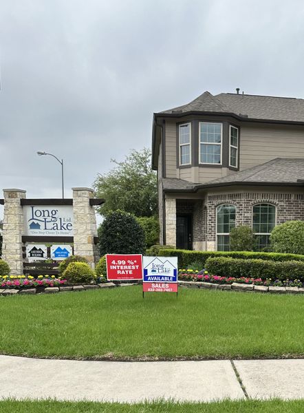 A charming brick home with lush landscaping in Forest Village by Long Lake Ltd. (Spring, TX). A charming brick home with lush landscaping in Forest Village by Long Lake Ltd. (Spring, TX).