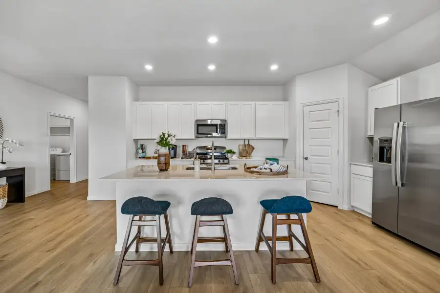 Furnished interior in a model home at The Canopies in Splendora (Image 6).