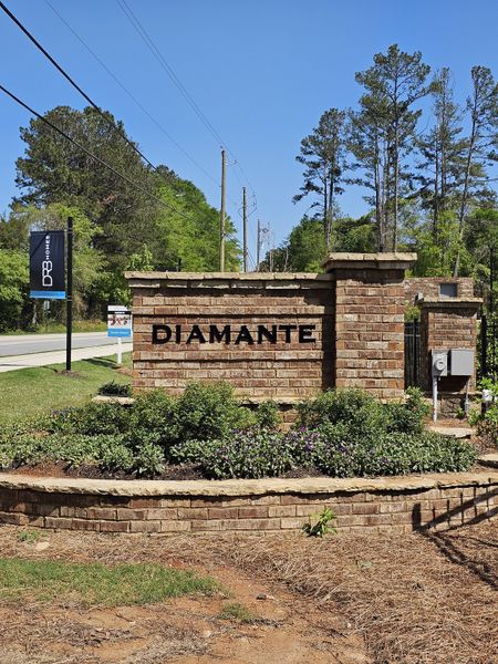 A welcoming brick entrance with lush landscaping at Diamante by DRB Homes in Stockbridge, GA. A welcoming brick entrance with lush landscaping at Diamante by DRB Homes in Stockbridge, GA.