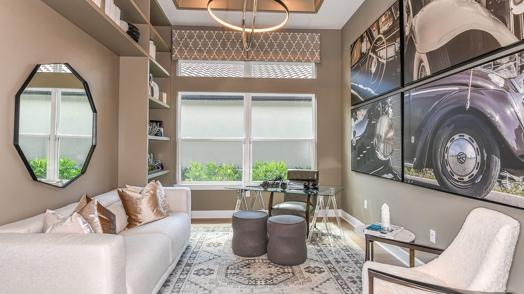 Furnished interior in a model home at Esplanade by the Islands in Naples (Image 56).