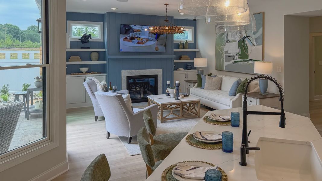 Furnished interior in a model home at The Courtyards at Hodges Farm in Charlotte (Image 36).
