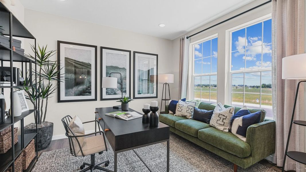 Timnath Lakes offers a chic office with expansive windows and plush green seating, merging elegance and functionality. Timnath Lakes offers a chic office with expansive windows and plush green seating, merging elegance and functionality.