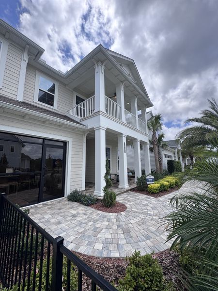 A beautiful two-story home with a spacious porch and landscaped entry in Reflections at Seabrook by ICI Homes (Nocatee, FL). A beautiful two-story home with a spacious porch and landscaped entry in Reflections at Seabrook by ICI Homes (Nocatee, FL).