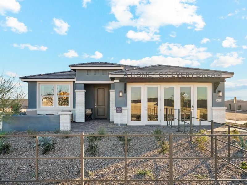 A house with a fence in front. A house with a fence in front.