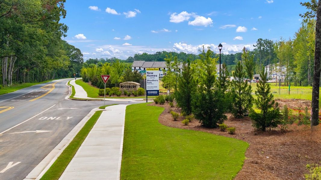 Entrance to the Woodbury Park community in Atlanta, GA, featuring signage and landscaping (Image 12).