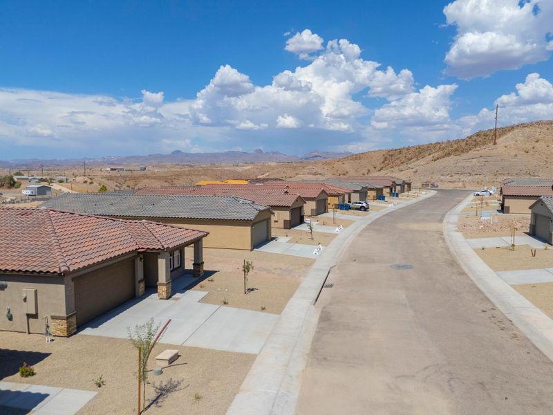 A road with buildings on the side.