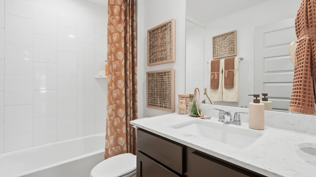 Furnished interior in a model home at Highland Village in Nome (Image 24).