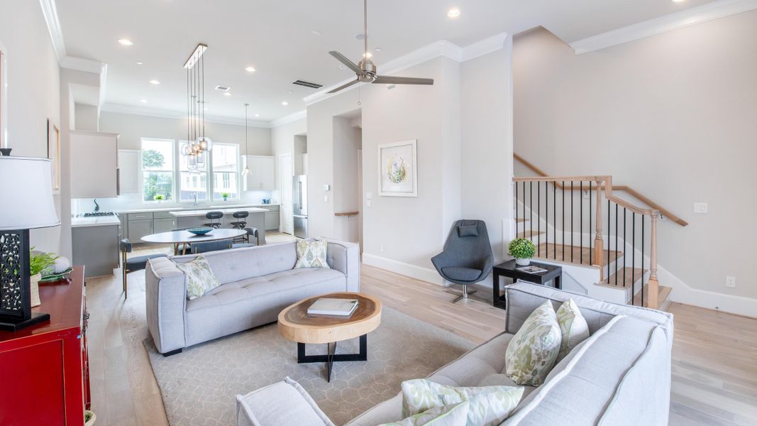 Furnished interior in a model home at Upper East River in Houston (Image 10).