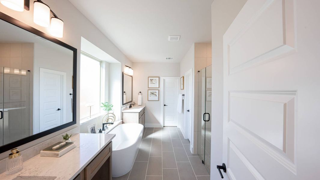 Furnished interior in a model home at High Country in Burleson (Image 5).