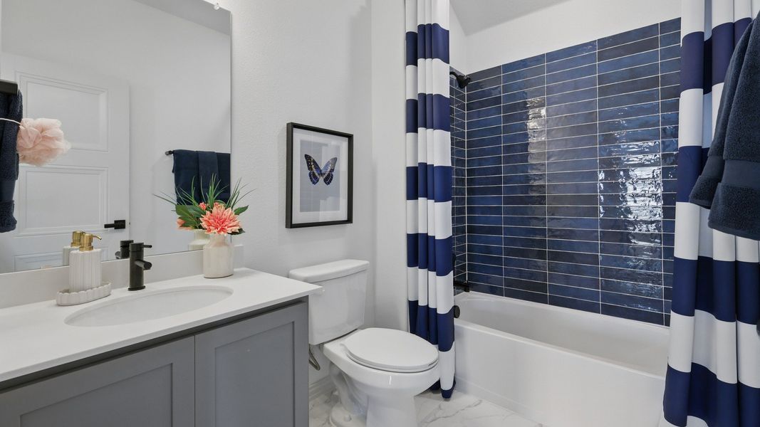 Furnished interior in a model home at Westridge Journey in McKinney (Image 42).