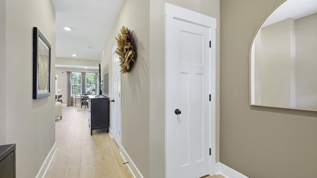 Superior design begins at the front door with a hardwood floor foyer and elegant sightlines by DRB Homes