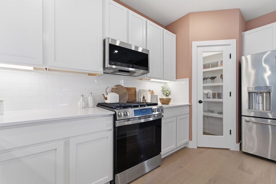 Furnished interior in a model home at Heartland in Heartland (Image 32).