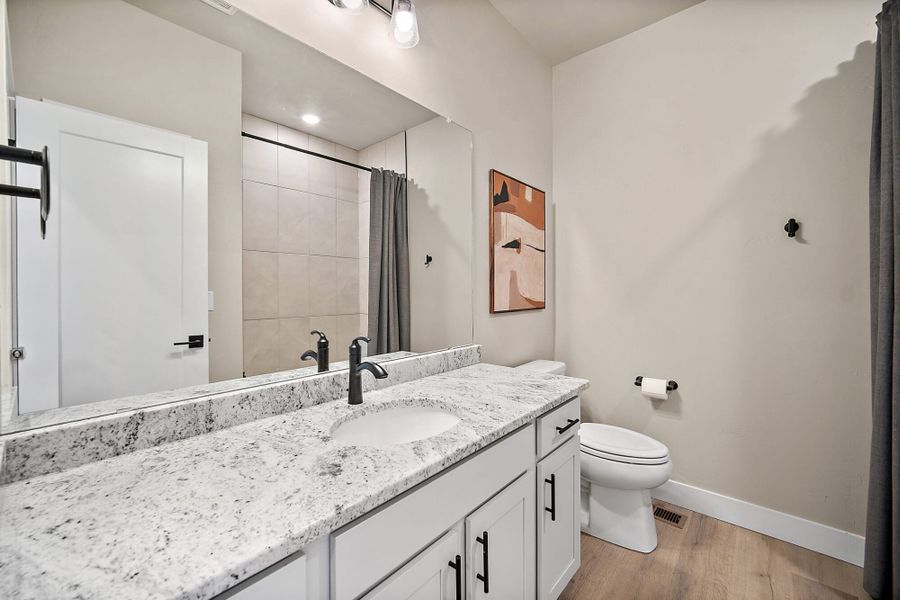 Furnished interior in a model home at The Glen-12 in Colorado Springs (Image 7).