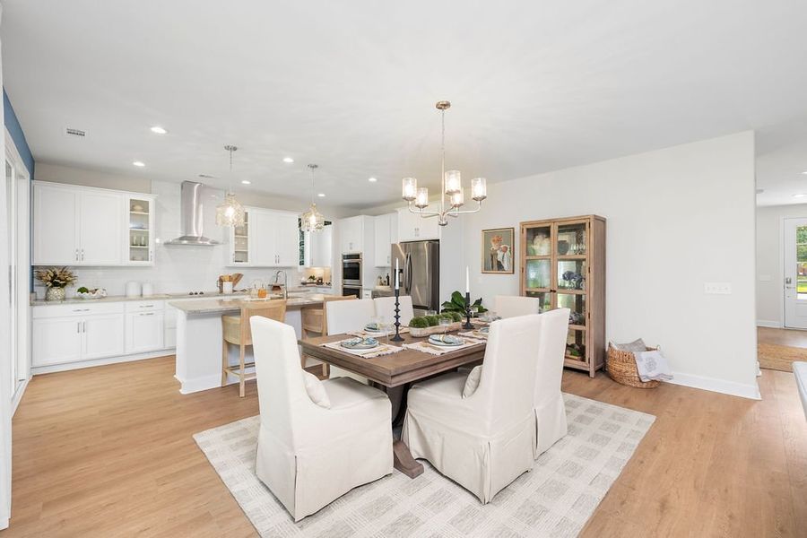 Furnished interior in a model home at Ramsey Landing in Rincon (Image 7).