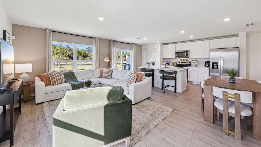 Furnished interior in a model home at Vineland Reserve in Osteen (Image 10).