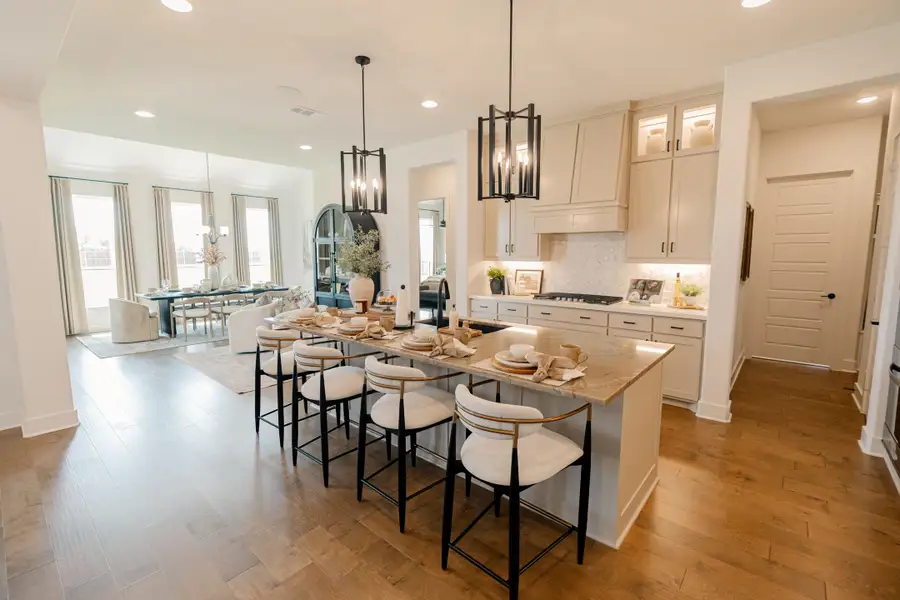 Furnished interior in a model home at Byrum Ranch in Maypearl (Image 3).