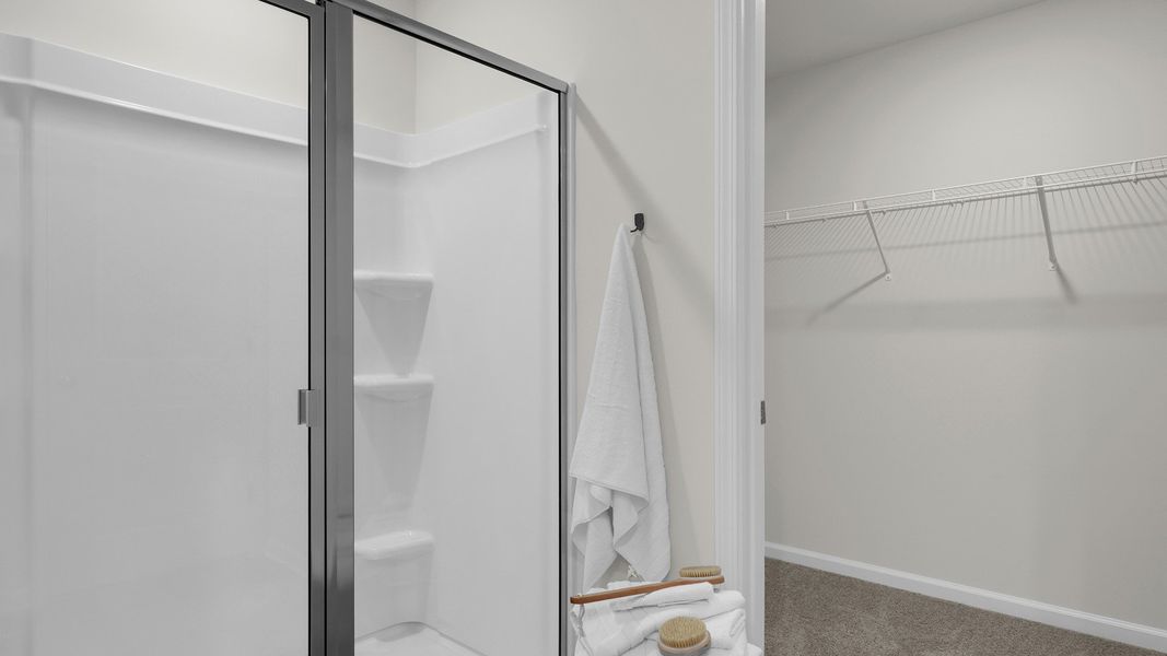 Furnished interior in a model home at The Cove at Mallard Crossing in Summerville (Image 38).