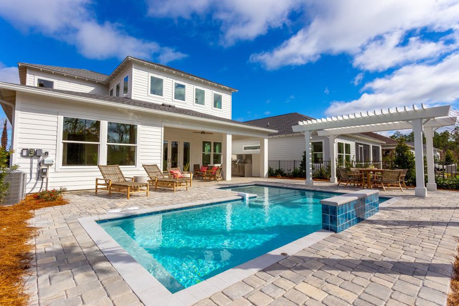 The stunning backyard of the Orchid model is the perfect backyard oasis.