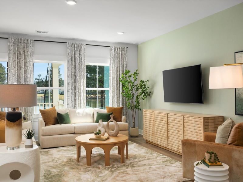 The great room comes with plenty of space that is great for hosting or relaxing with family.