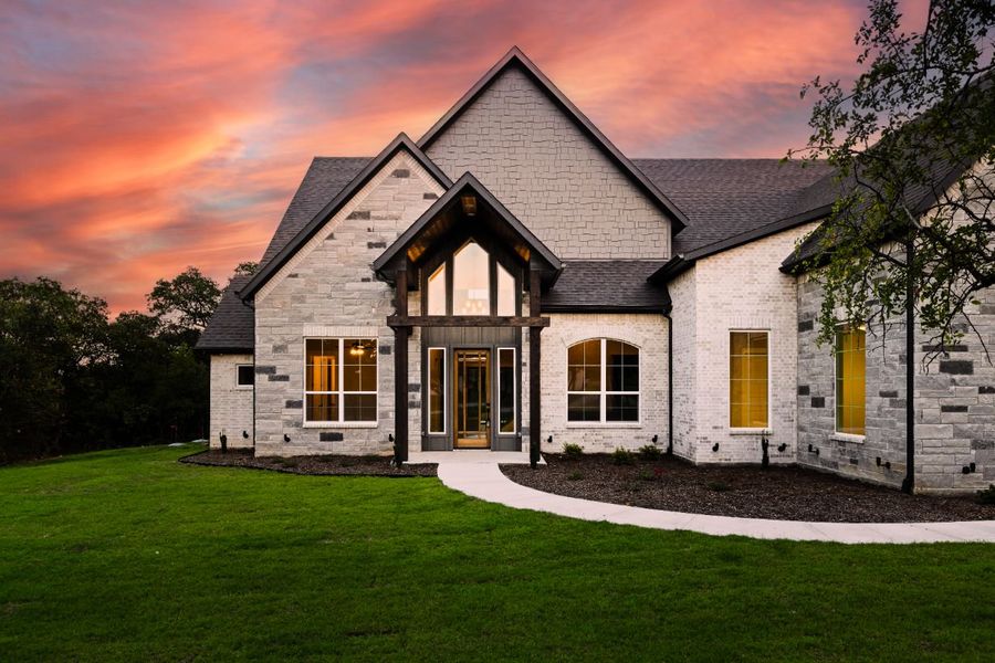 Front exterior of a home in the Lola Creek Ranch community, located in Boyd, TX (Image 17).