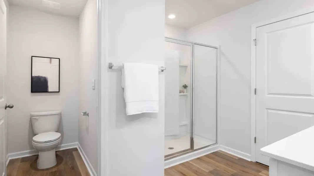 Furnished interior in a model home at Sweetwater Village in Rockwell (Image 19).