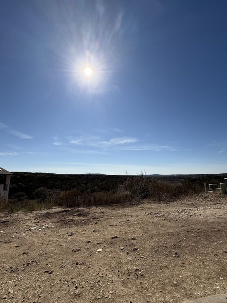 A stunning undeveloped lot with panoramic views of rolling hills and lush greenery in Lakeside at Tessera by Coventry Homes (Lago Vista, TX).
