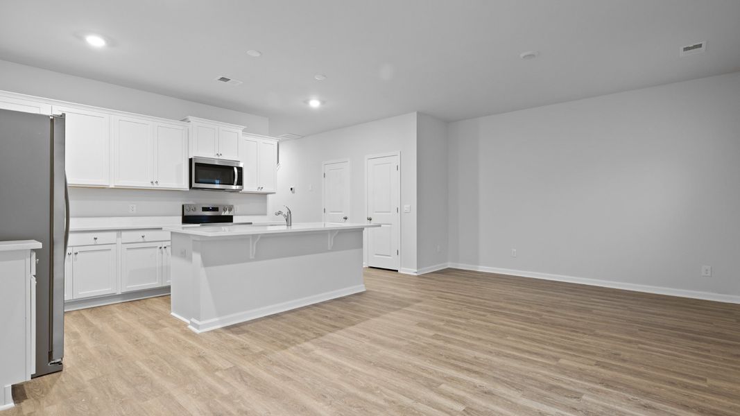 Furnished interior in a model home at Garbon Fields in Summerville (Image 5).