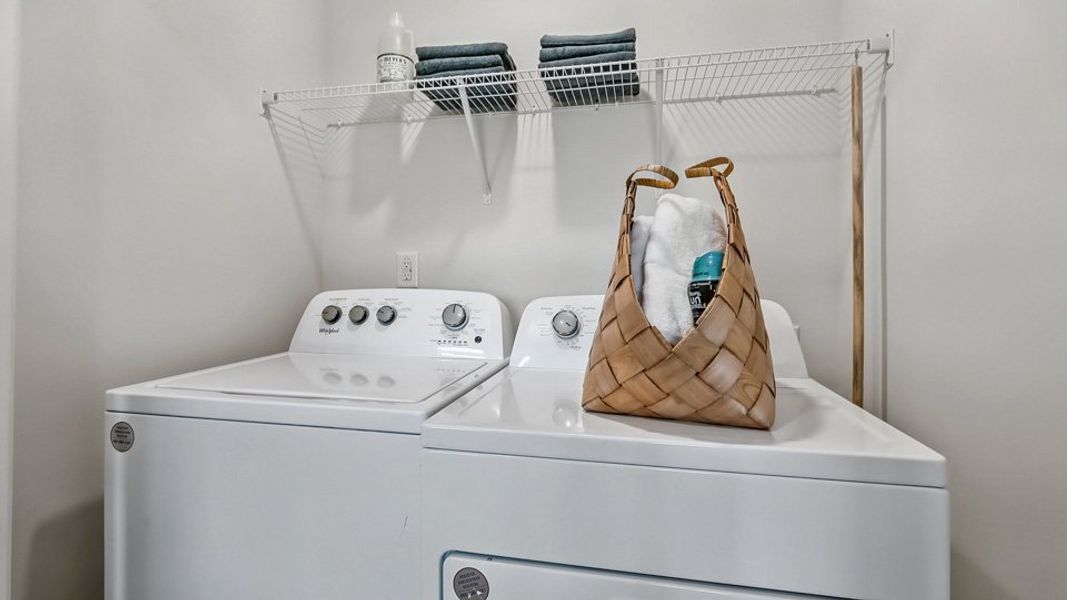 Furnished interior in a model home at The Townes at Prestleigh in Wake Forest (Image 28).