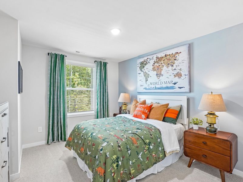 Furnished interior in a model home at Cadence Meadows in Zebulon (Image 19).