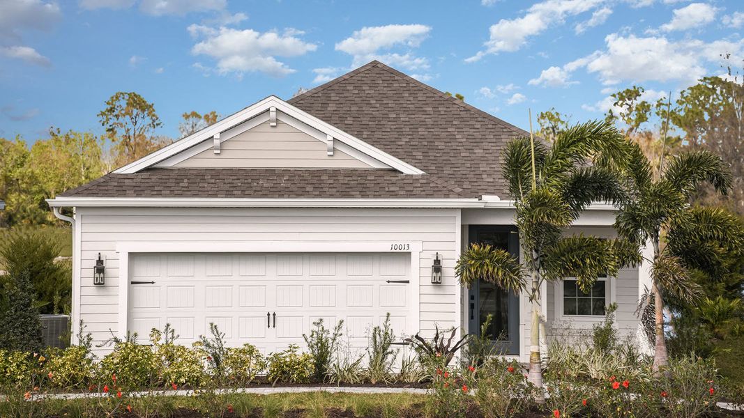 Front exterior of a home in the Wildleaf at North River Ranch community, located in Parrish, FL (Image 3).