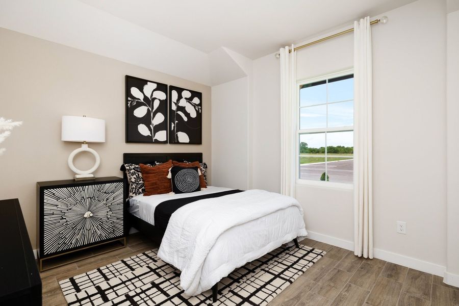 Furnished interior in a model home at Alberta Heights in Edinburg (Image 45).