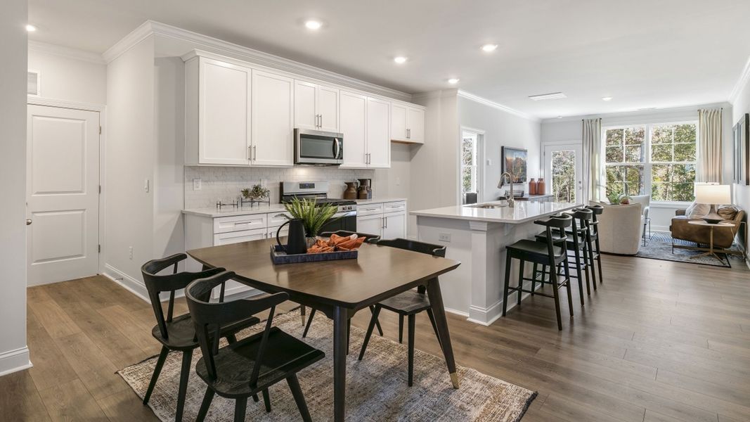 Furnished interior in a model home at The Meadows at Kinsley in Jamestown (Image 6).