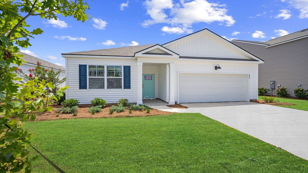 Front exterior of a home in the The Retreat at East Argent community, located in Ridgeland, SC (Image 18).