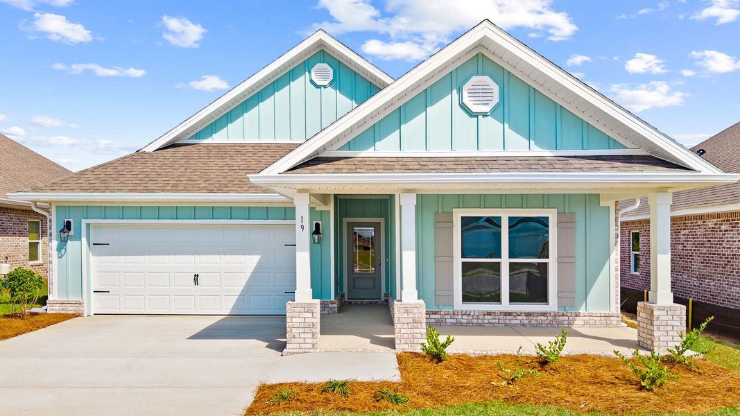 Front exterior of a home in the Owl's Head Farms community, located in Freeport, FL (Image 14).