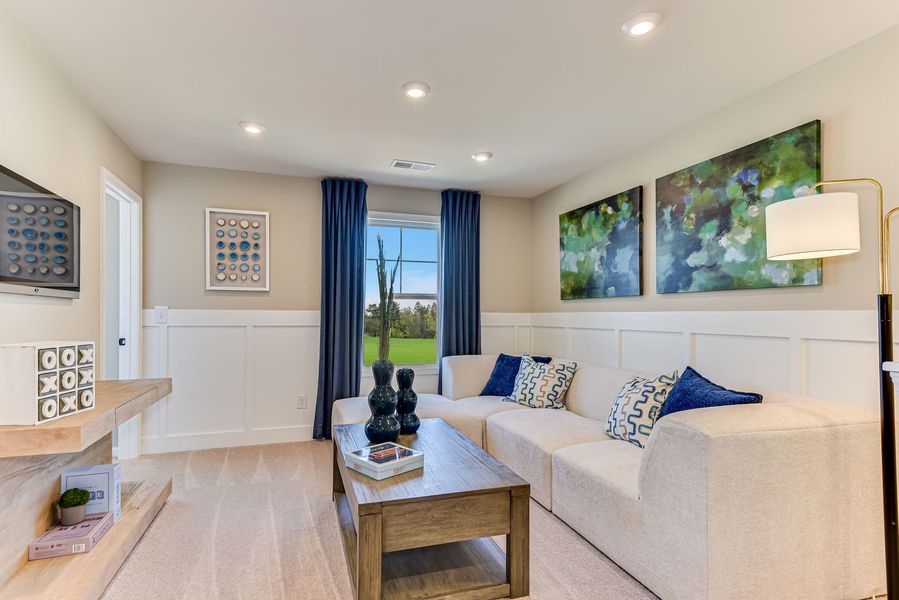 Upper-level flex space offers a versatile area for a second family room, hobby space, or additional living space tailored to your needs