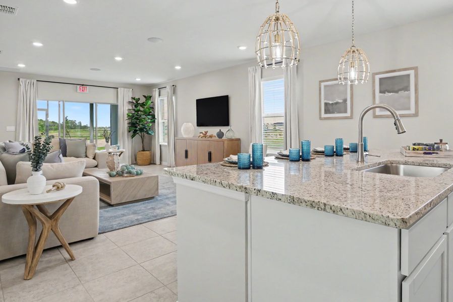 Furnished interior in a model home at Malabar Springs Signature in Palm Bay (Image 3).
