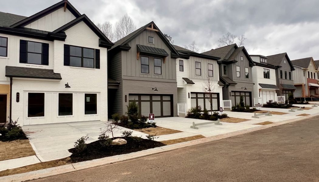 Front exterior of a home in the The Towns at Auburn Station East community, located in Auburn, GA (Image 3).