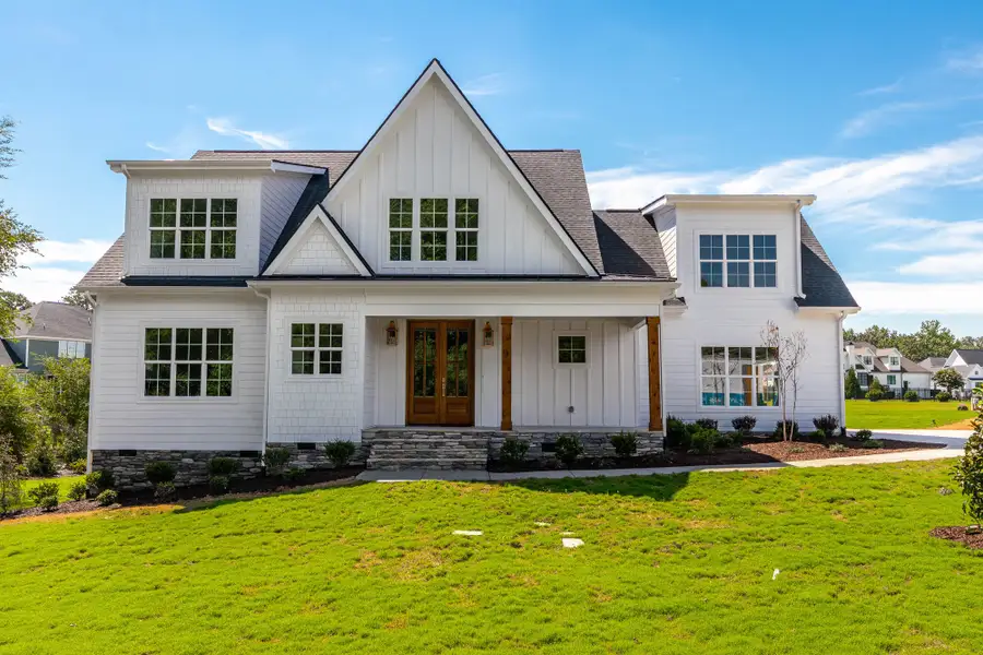 Front exterior of a home in the Eller Farms community, located in Wendell, NC (Image 3). Front exterior of a home in the Eller Farms community, located in Wendell, NC (Image 3).