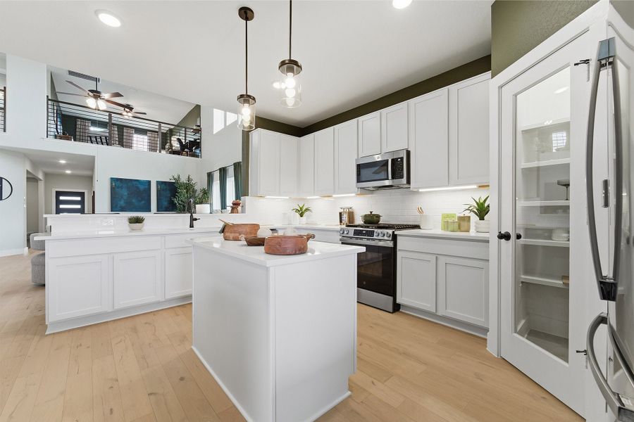 Furnished interior in a model home at Infinity Square in Kyle (Image 23).