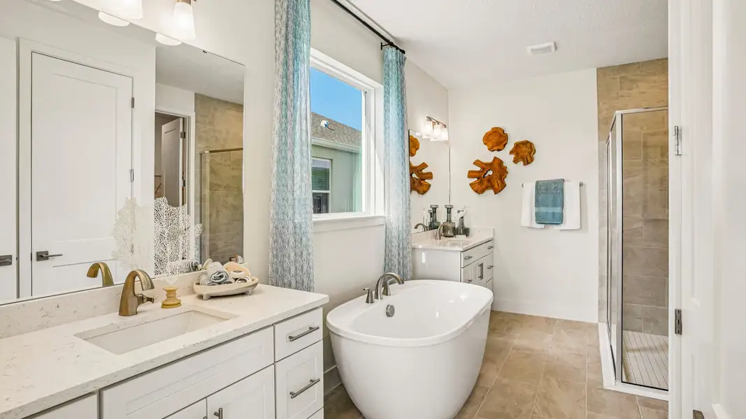 Primary En Suite Bathroom | Oleander Model Home at Ardisia Park in New Smyrna Beach