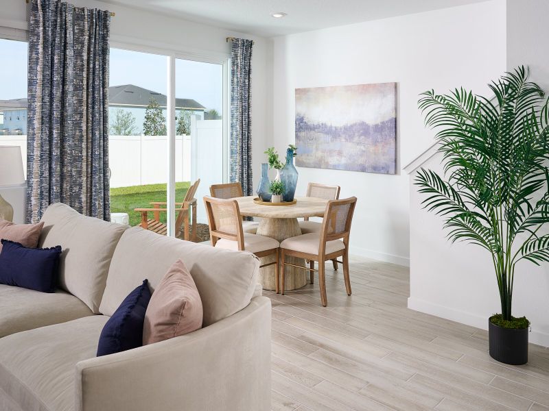 Furnished interior in a model home at The District at Oakleaf - The Grove in Middleburg (Image 5).