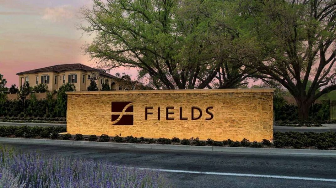 Entrance to the Fields - Brookside community in Frisco, TX, featuring signage and landscaping (Image 2). Entrance to the Fields - Brookside community in Frisco, TX, featuring signage and landscaping (Image 2).