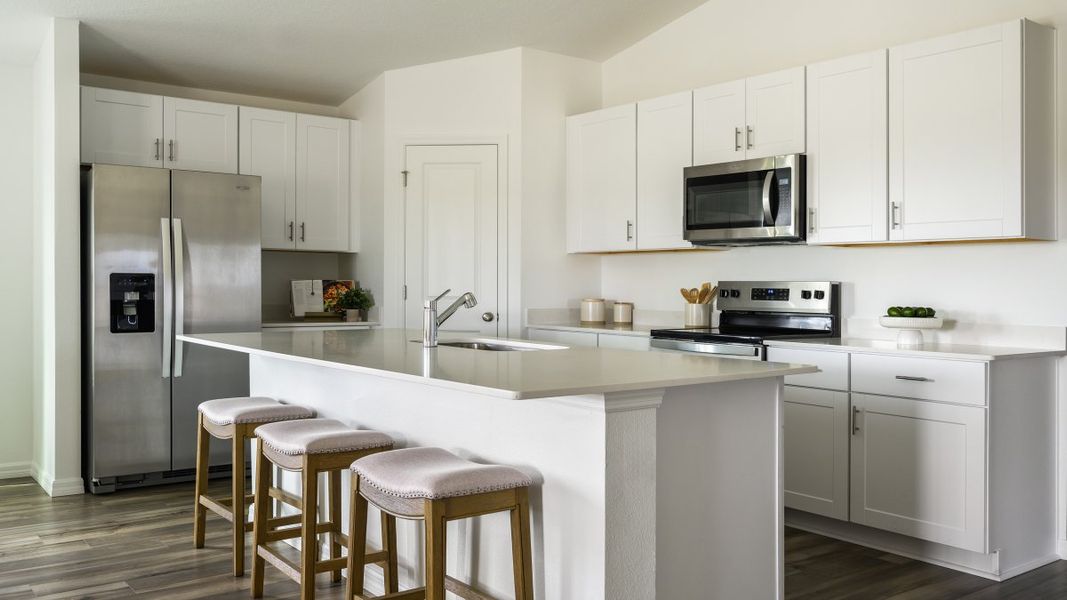 Furnished interior in a model home at Pasadena Ridge in Zephyrhills (Image 5).