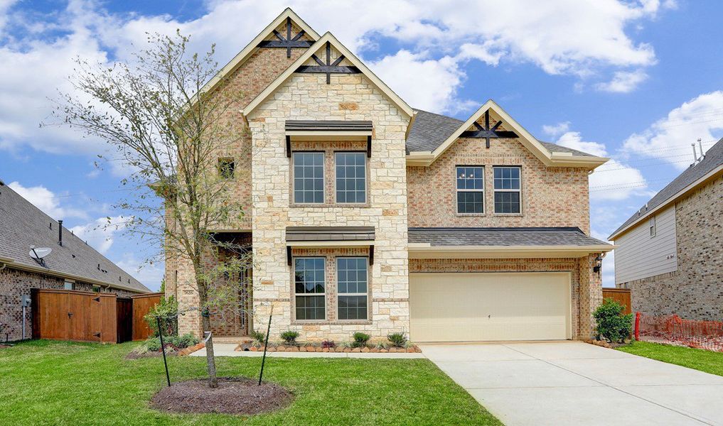 Front exterior of a home in the Waterstone on Lake Conroe community, located in Montgomery, TX (Image 11). Front exterior of a home in the Waterstone on Lake Conroe community, located in Montgomery, TX (Image 11).