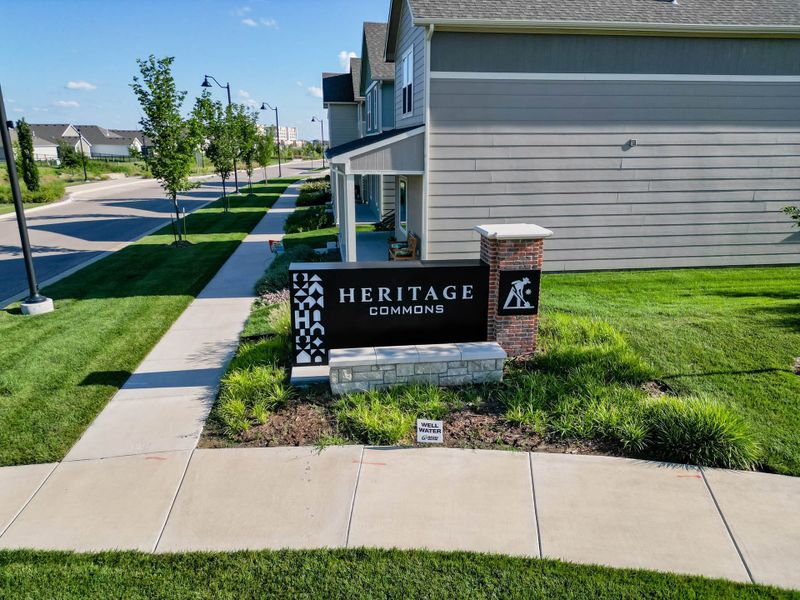 Entrance to the Heritage Commons community in Andover, KS, featuring signage and landscaping (Image 26). Entrance to the Heritage Commons community in Andover, KS, featuring signage and landscaping (Image 26).
