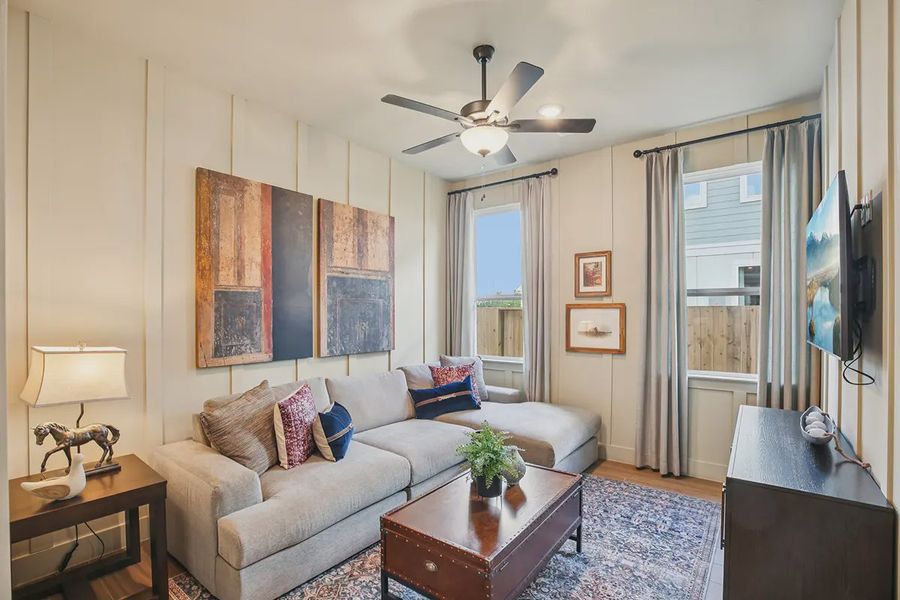 Furnished interior in a model home at Meridiana 50's in Manvel (Image 15).