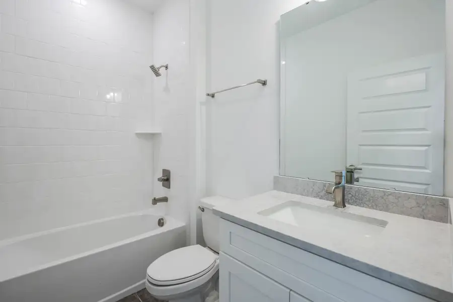 Furnished interior in a model home at Harvest at Ovation - Townhomes in Winter Garden (Image 66).