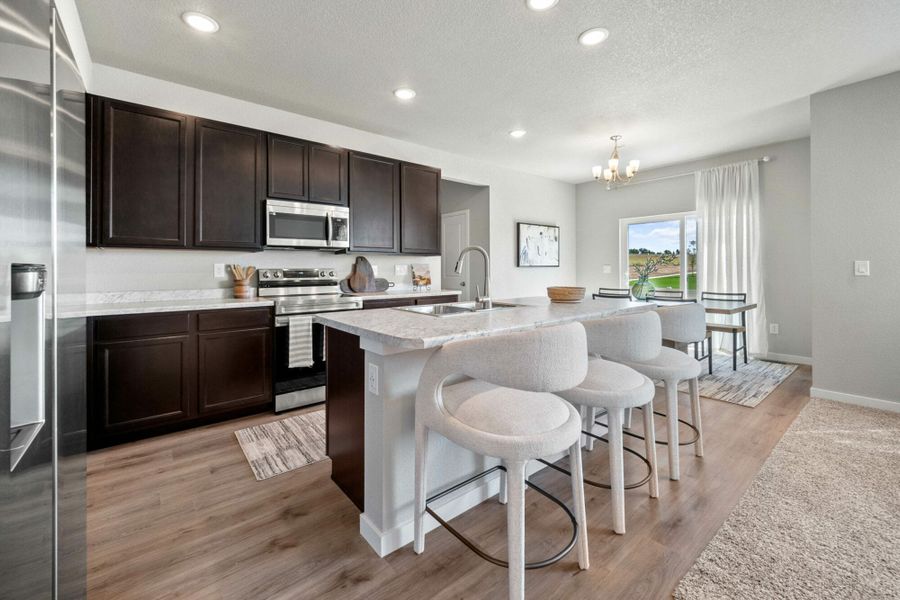 Furnished interior in a model home at Aspen Ranch in Fountain (Image 2).