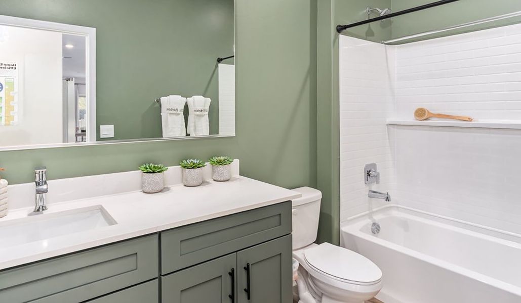 Furnished interior in a model home at Coronet at Gladden Farms in Marana (Image 56).