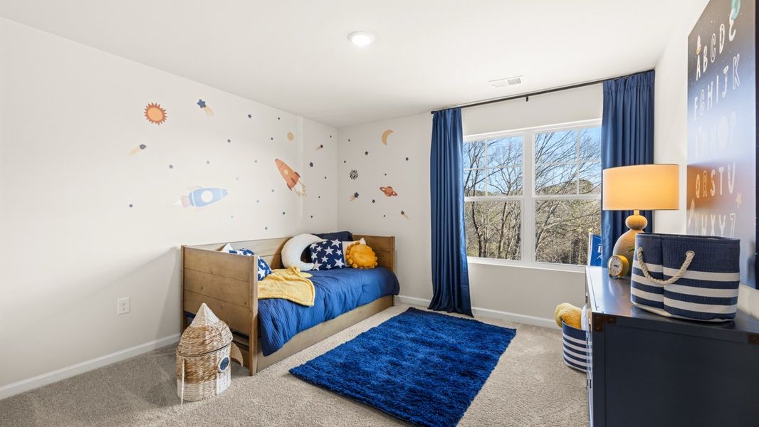 Furnished interior in a model home at Liberty Crossing in Braselton (Image 18).